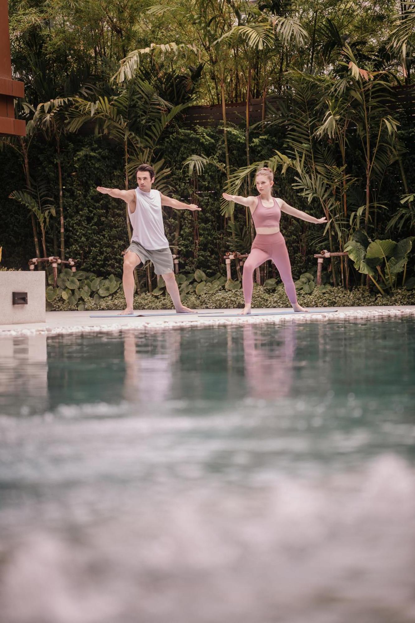 Nysa Hotel Bangkok Sukhumvit 11 Exteriör bild A couple practicing yoga